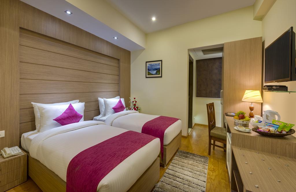 Cygnett Inn Repose Ґувахаті Номер фото